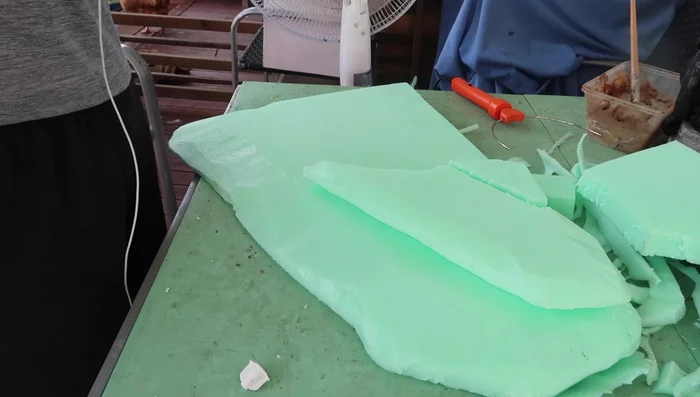 Attach the foam pieces using Gorilla glue, ensuring surfaces are wet for proper activation.