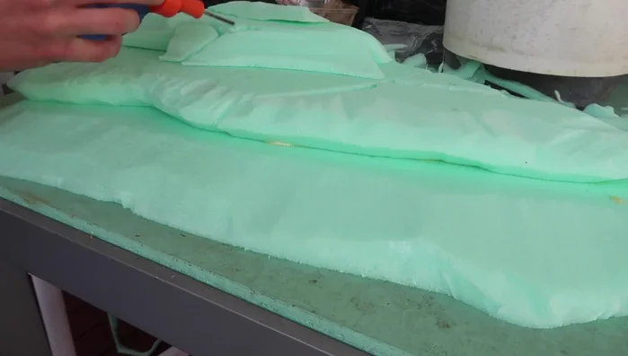 Use a soldering iron to carve lines, crevices, and details into the foam, mimicking natural rock formations.