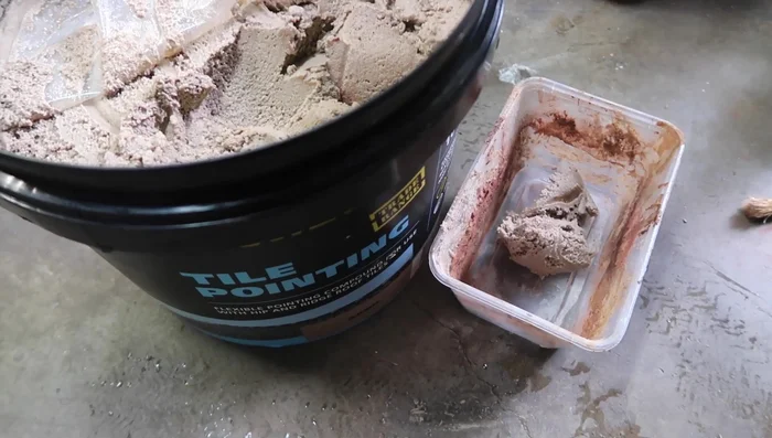 Add cement oxide colorants to the tile pointing for desired coloration.