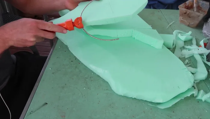 Attach the foam pieces using Gorilla glue, ensuring surfaces are wet for proper activation.