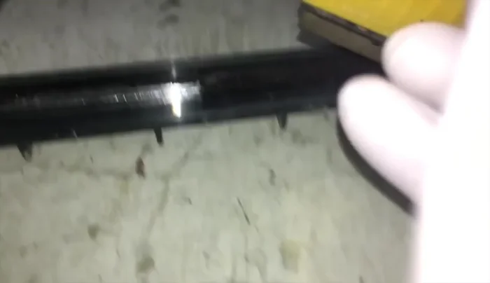 Carefully remove the old silicone sealant around the leak using an Exacto knife. Wear safety glasses to protect your eyes from flying glass shards.