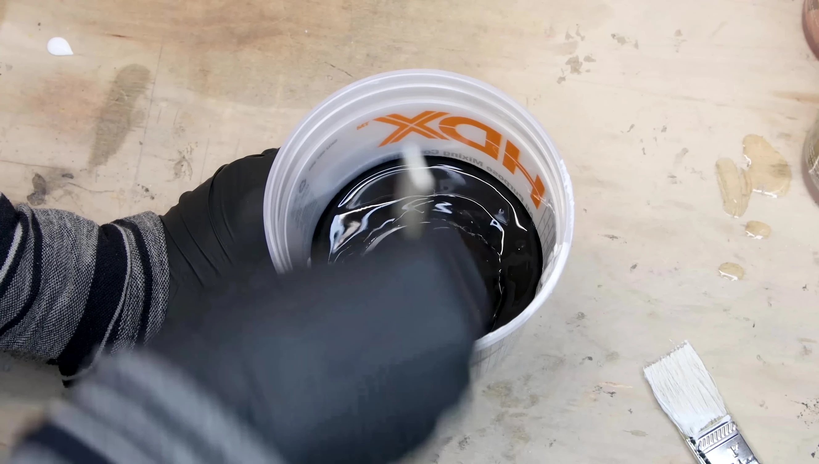 Applying black dry lock