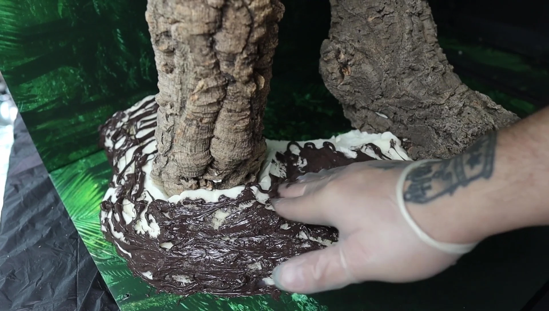 Applying silicone like frosting a cake.