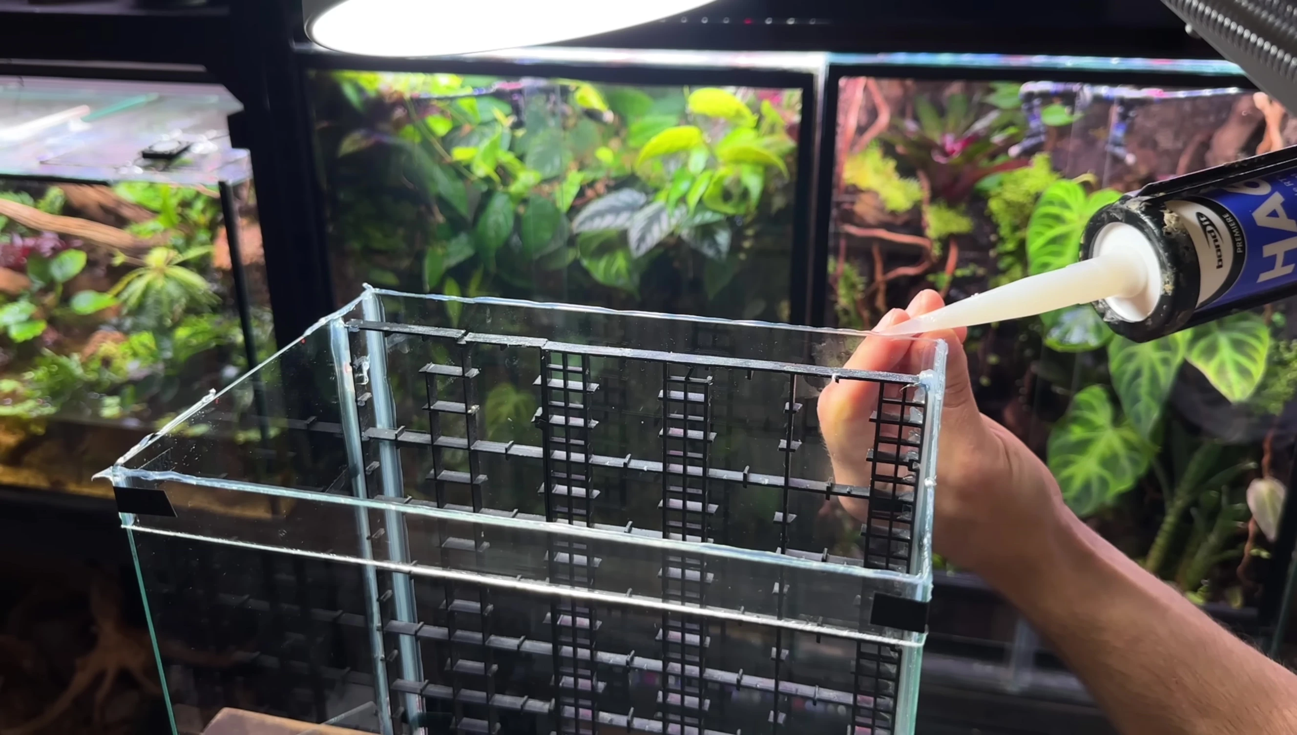 Attaching the window screen mesh to the lid