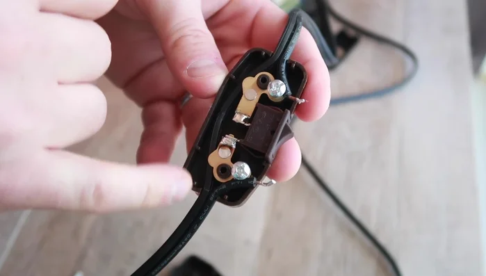 Wrap the cut wire around each screw of the new switch and tighten securely.