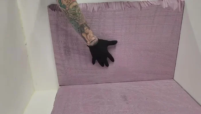 Silicone the back and place side panels in the enclosure, adding weight to secure.