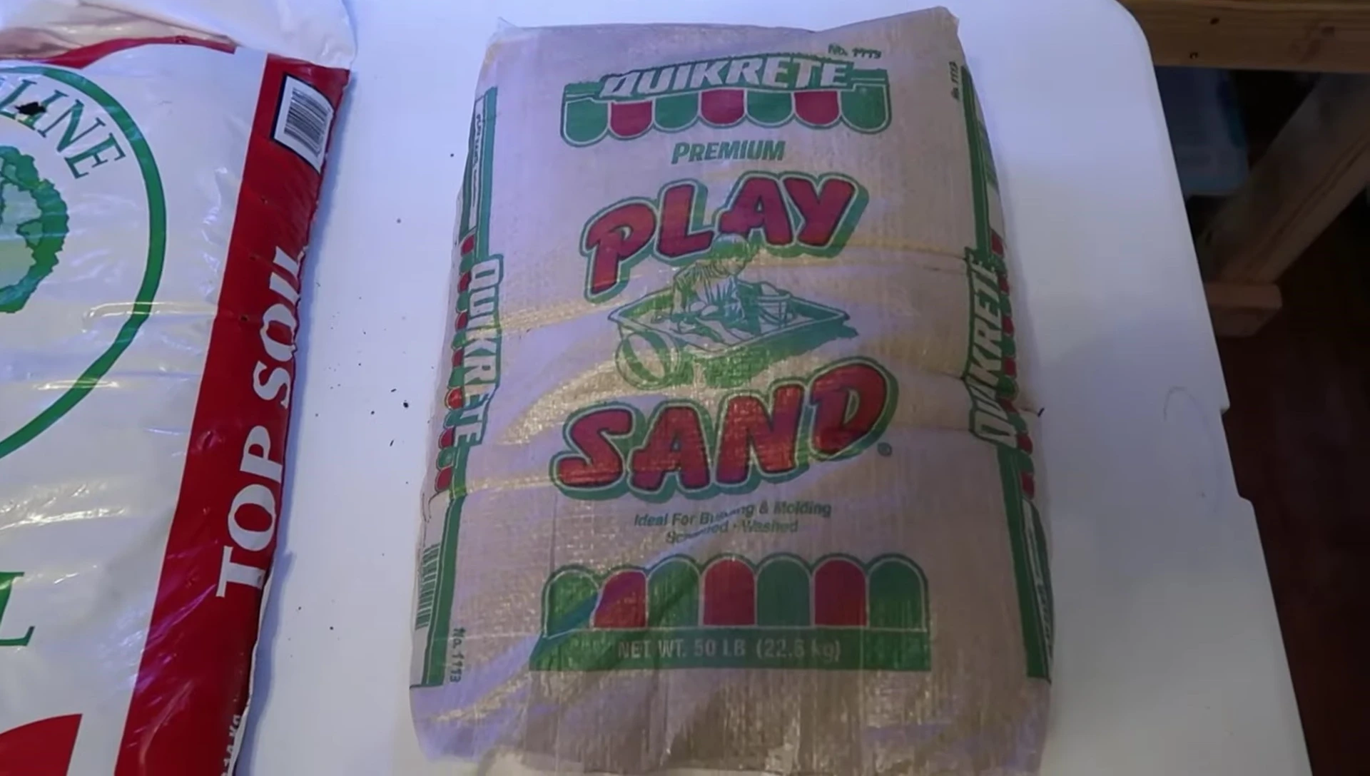 Home Depot play sand bag shown.