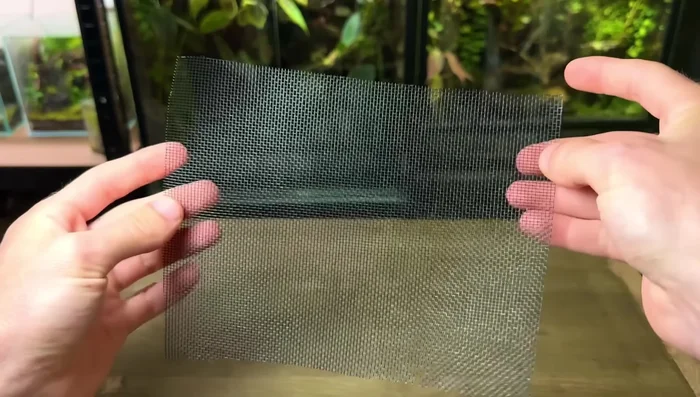 Use a substrate barrier (unless using very fine gravel). Window screen mesh works well to separate drainage and substrate layers.