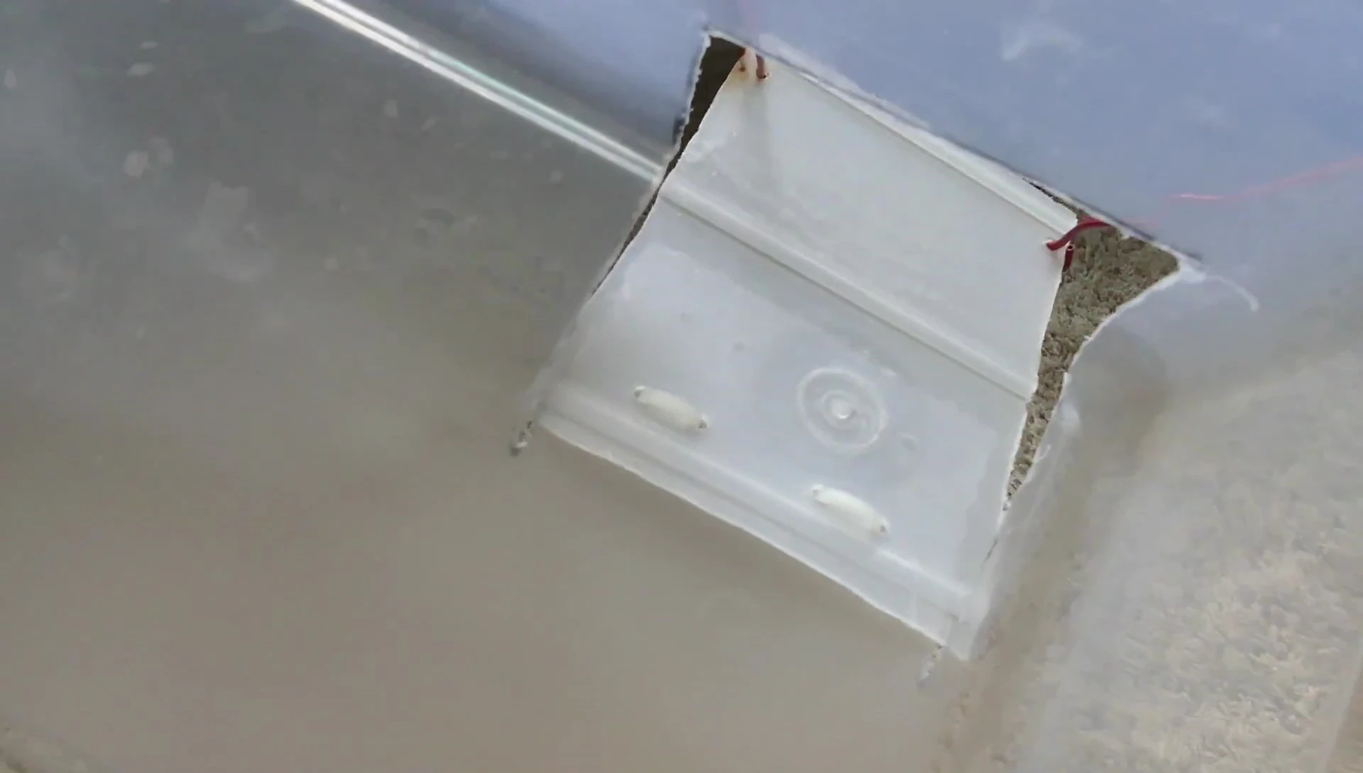 Drilling holes and attaching the ramp.