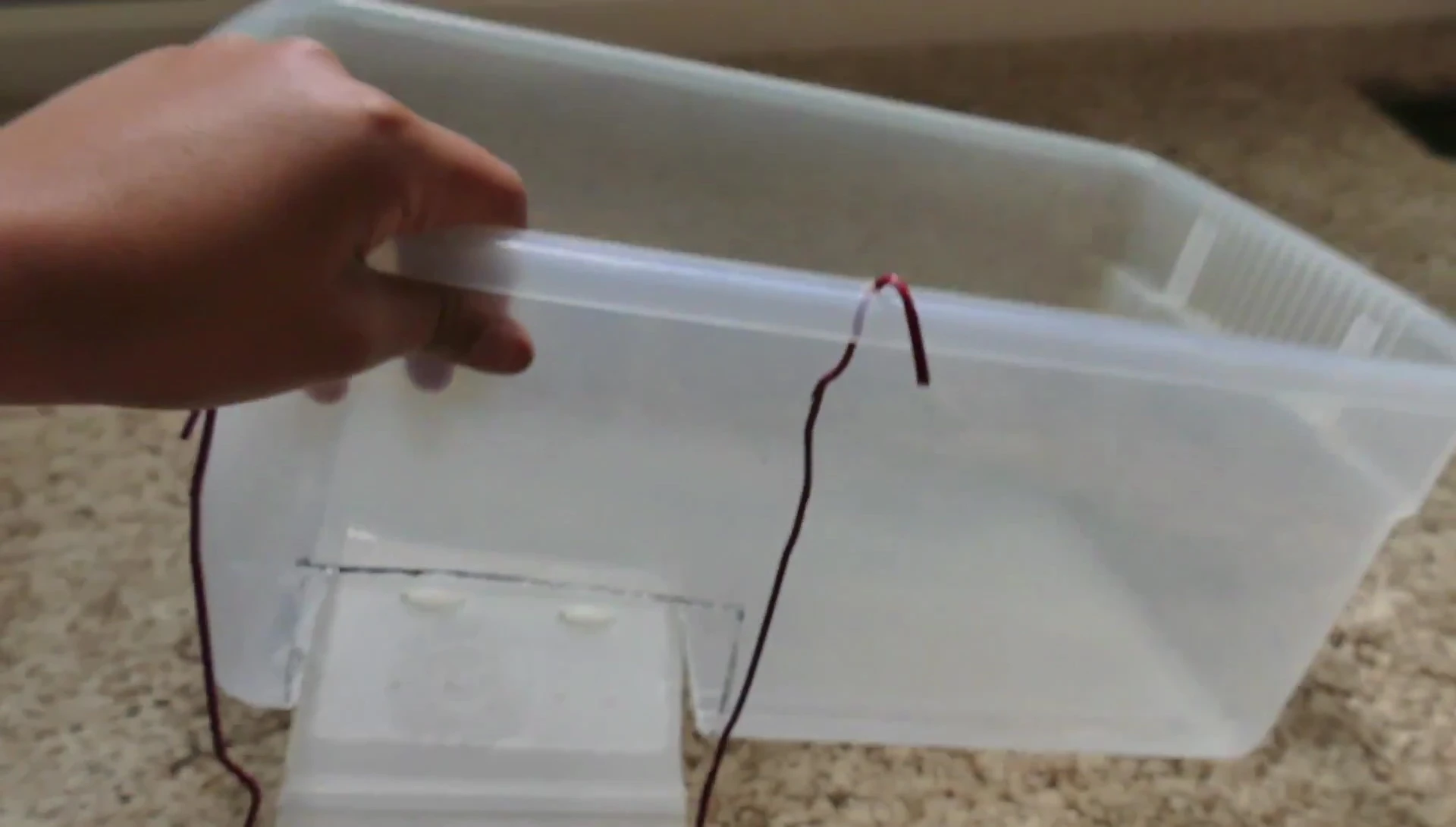 Applying rubber shelving liner for better grip.