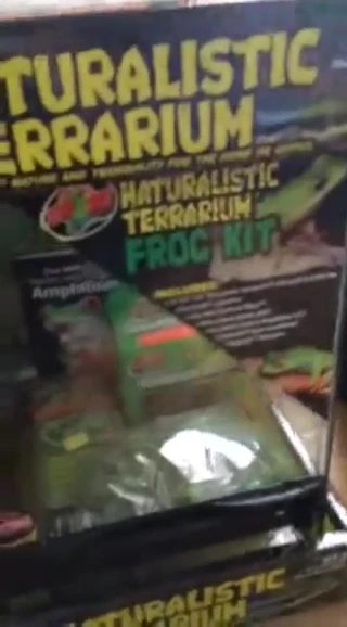 Close-up shot of the opened box, revealing the kit's contents.