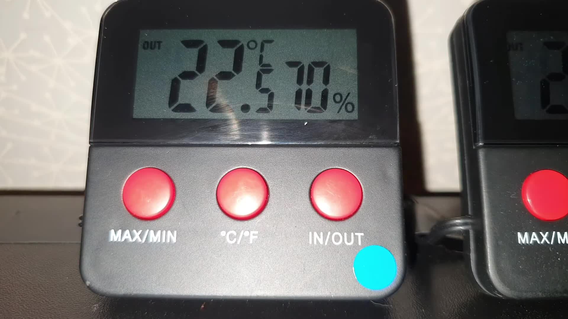 Close-up showing temperature and humidity readings on the display