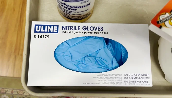 Always wear nitrile gloves when handling animals or performing spot cleaning.