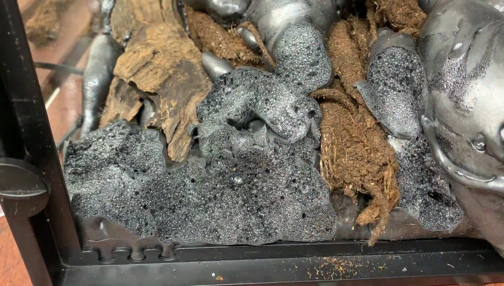Using a snap-off knife and razor blade to carve the foam
