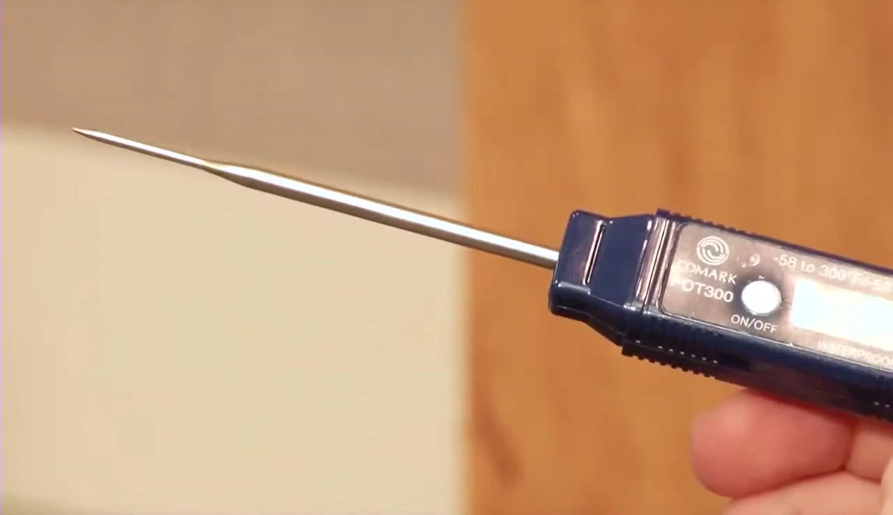 A digital thermometer displayed on the screen