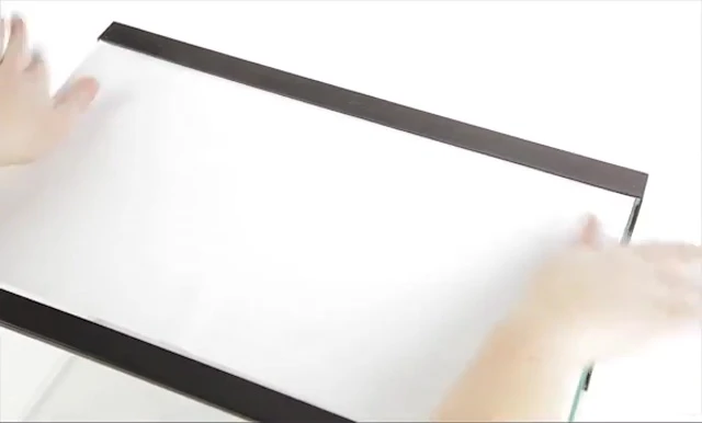 Using an even downward motion to press the HabitatWraps background.