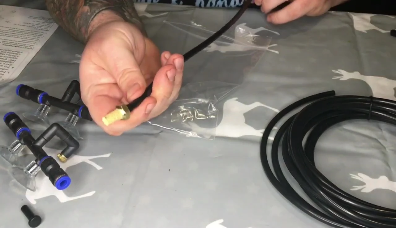 The copper filter head attached to the tubing