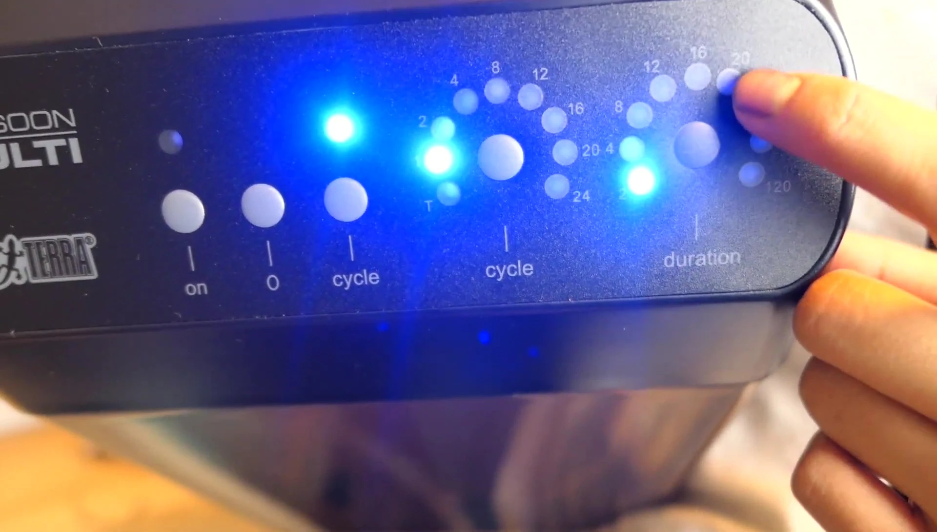 The control panel display highlighting the duration setting.