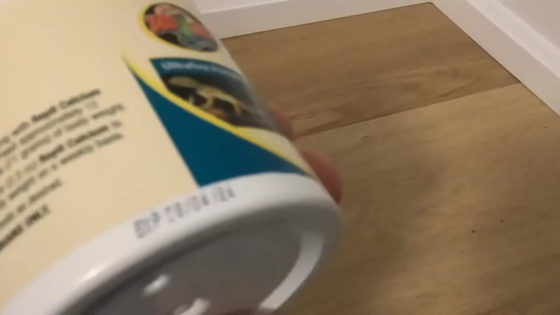 The reviewer holding the product