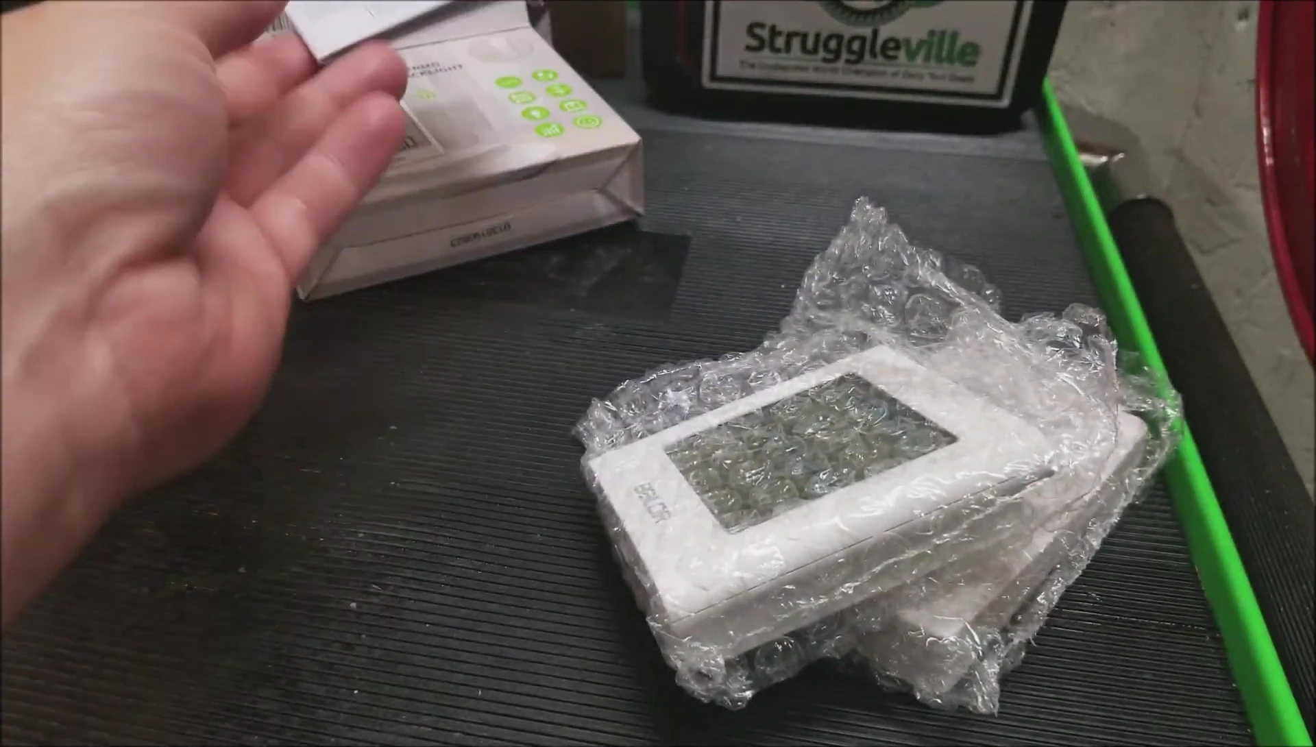 Close-up of the indoor unit and the magnetic outdoor sensor.
