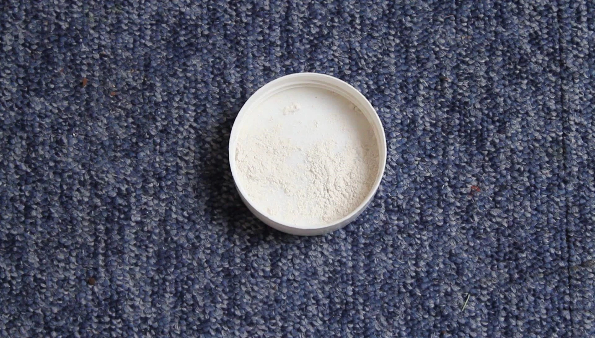 Image showcasing a container of calcium supplement.