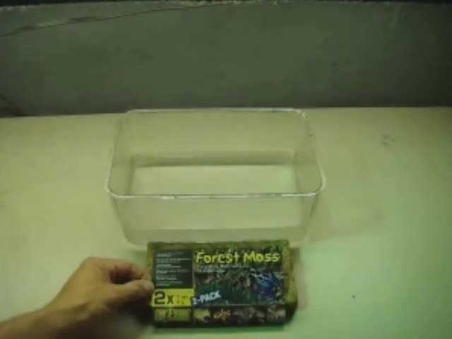 Close-up of the ExoTerra moss brick packaging