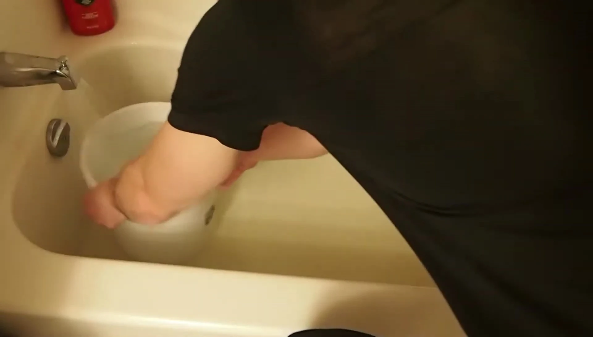 Adding bleach to the water