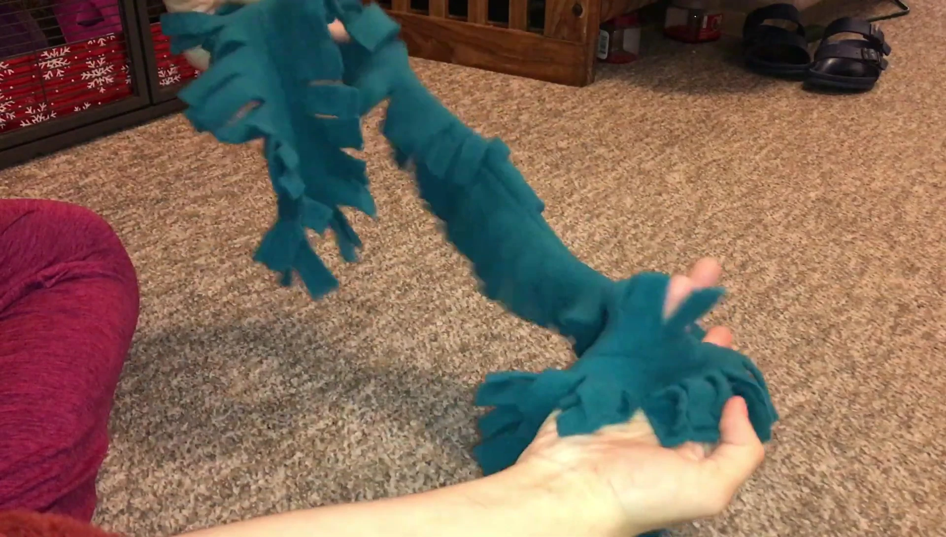 Fabric toy shown, highlighting its texture and length