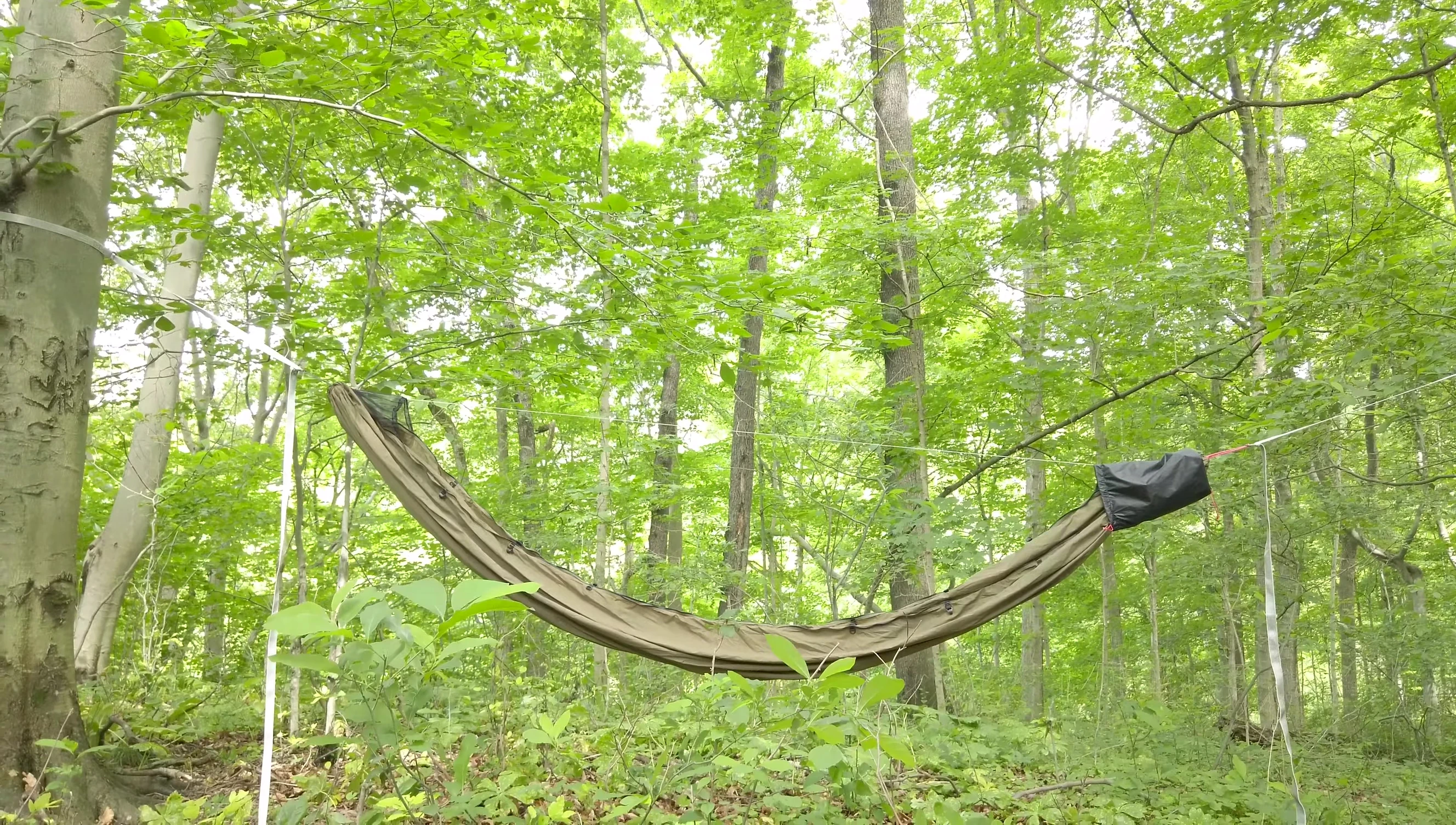 The hammock hung between trees, showcasing the 30-degree angle.
