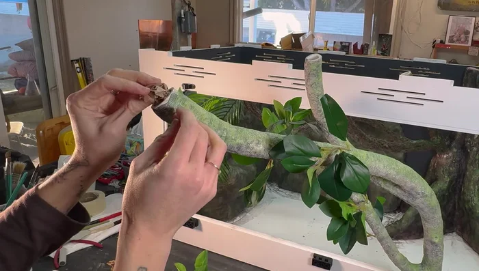 Seal open branch ends: Add epoxy clay, packing paper and texture as needed to cap off the open ends of branches.