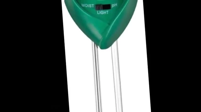 Close-up of the 3-in-1 soil meter displaying soil moisture reading.