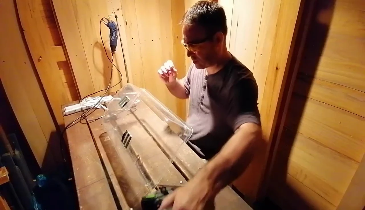 Drilling holes to secure the hygrometer