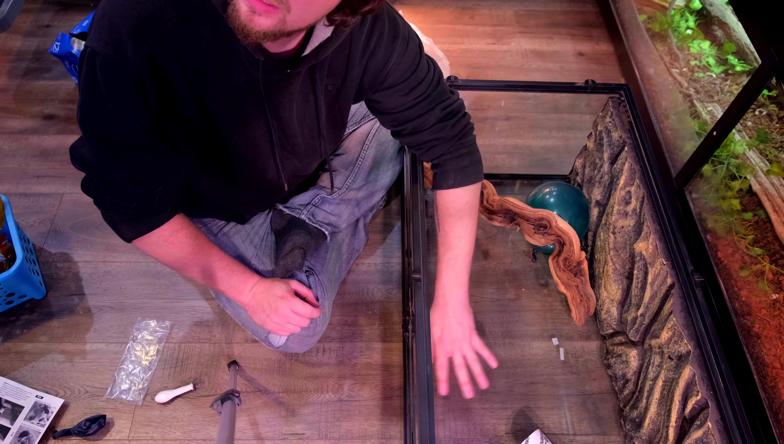 Demonstrating the technique for using balloons and strings to create the tunnel system.