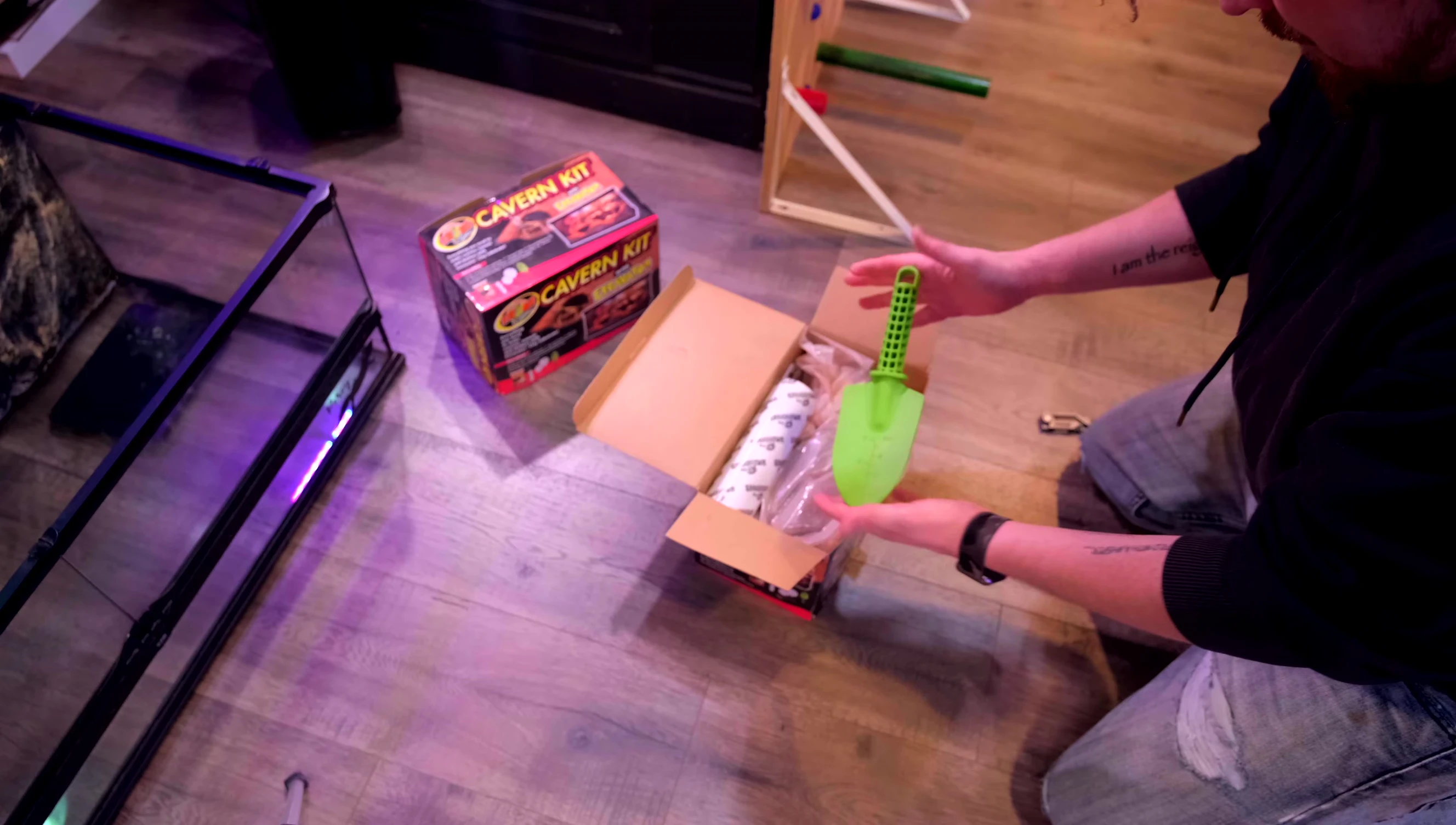The contents of the ZooMed Excavator Clay Cavern Kit being unpacked.