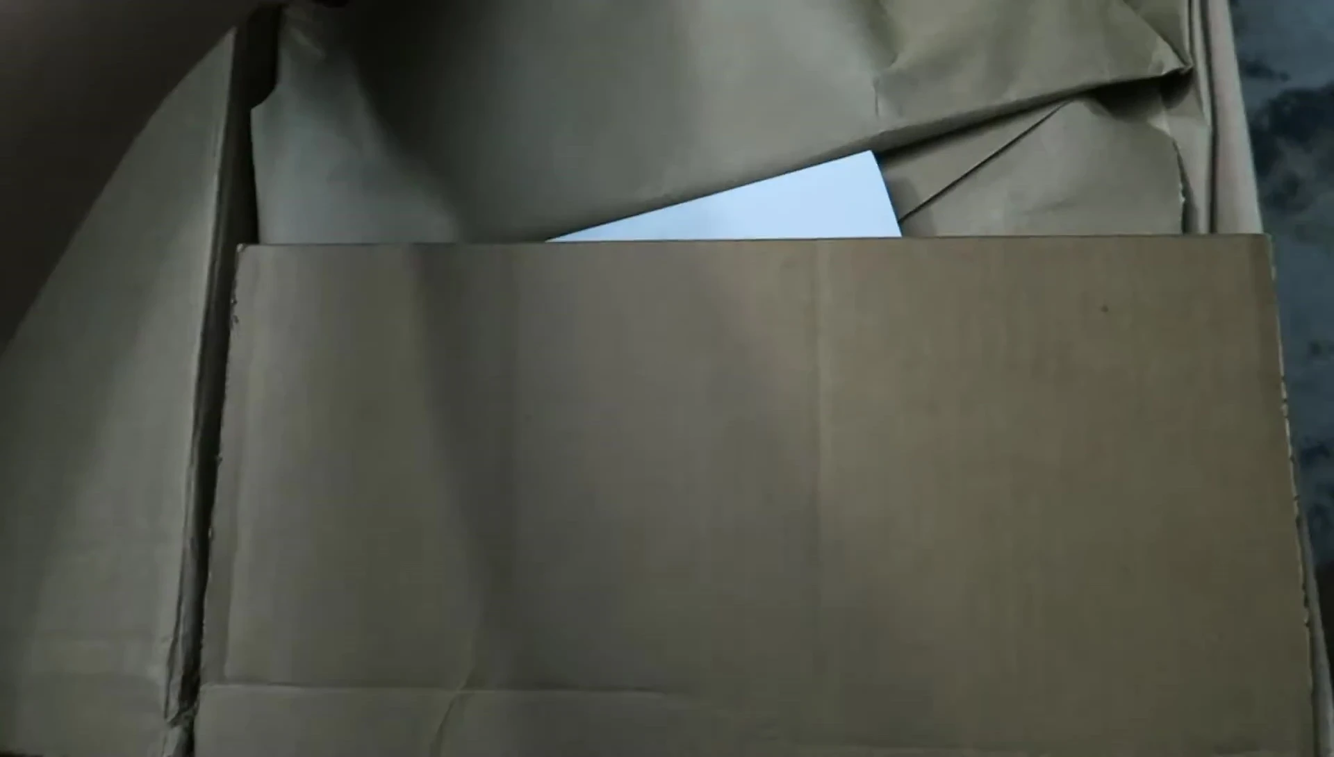 Opening the box and revealing the large cork bark pieces.
