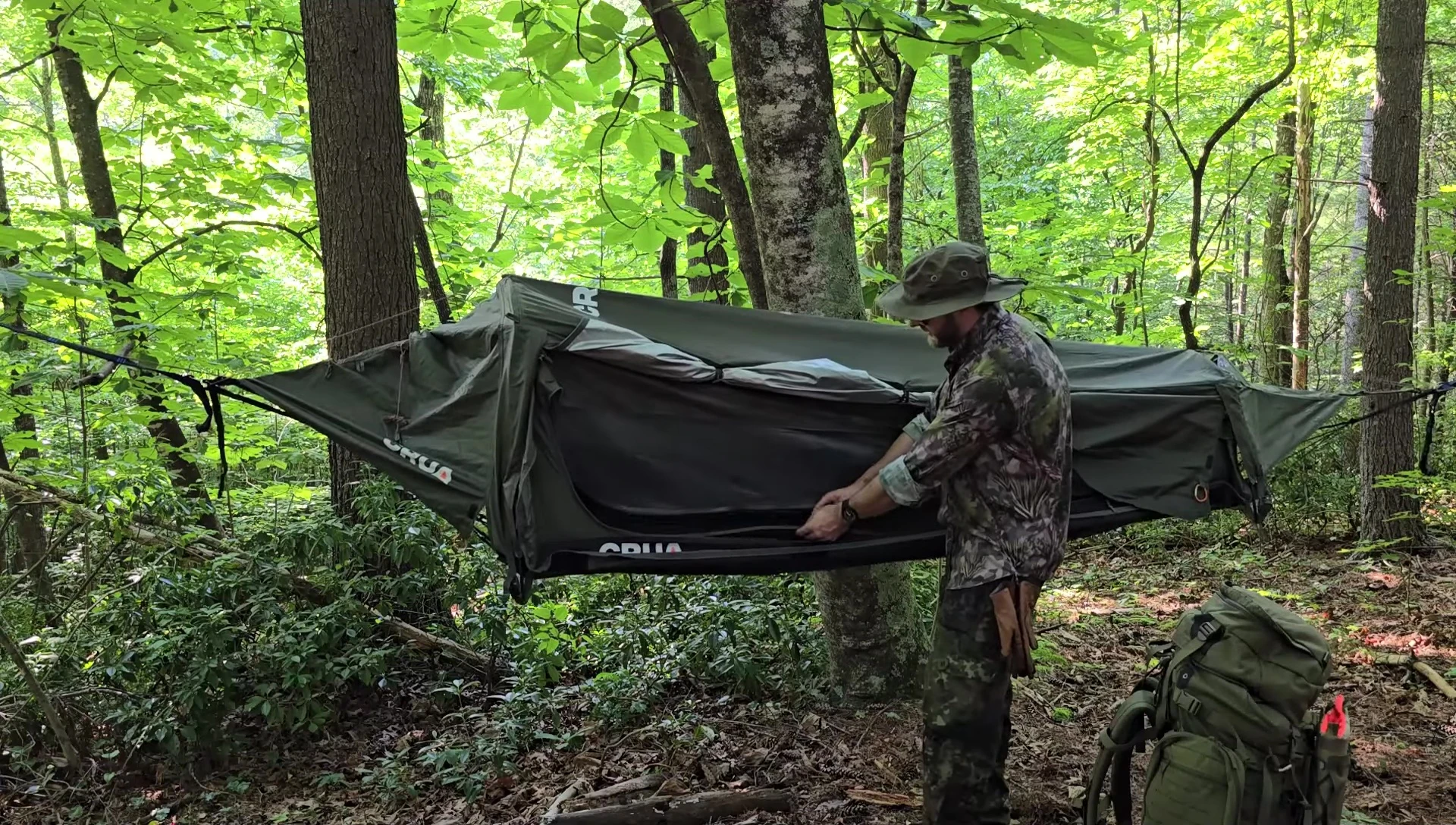 The thin USMC pad inside the hammock tent.